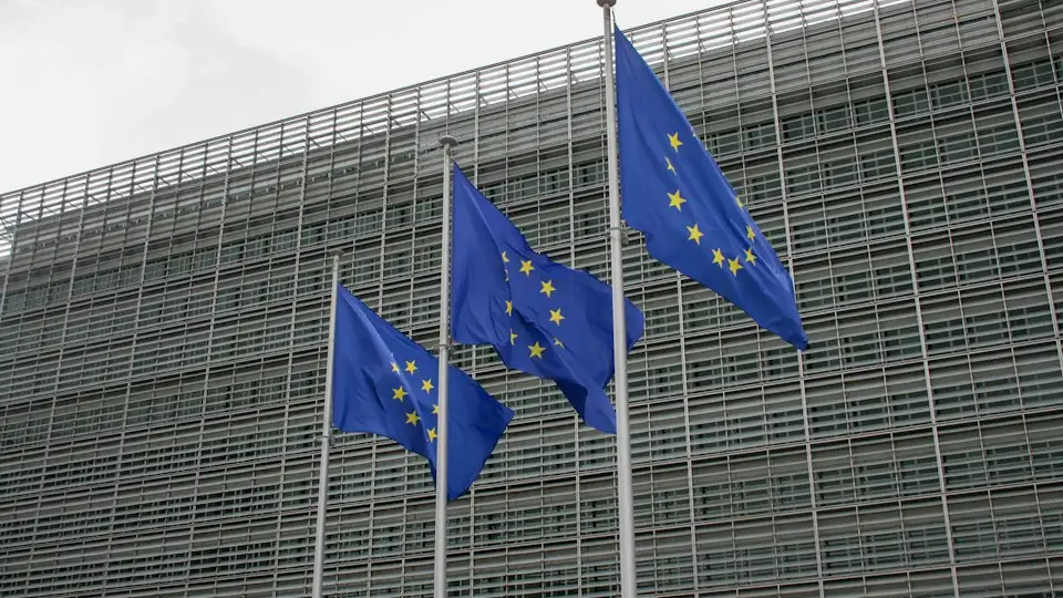 European Union flags in front of the European Commission in Brussels